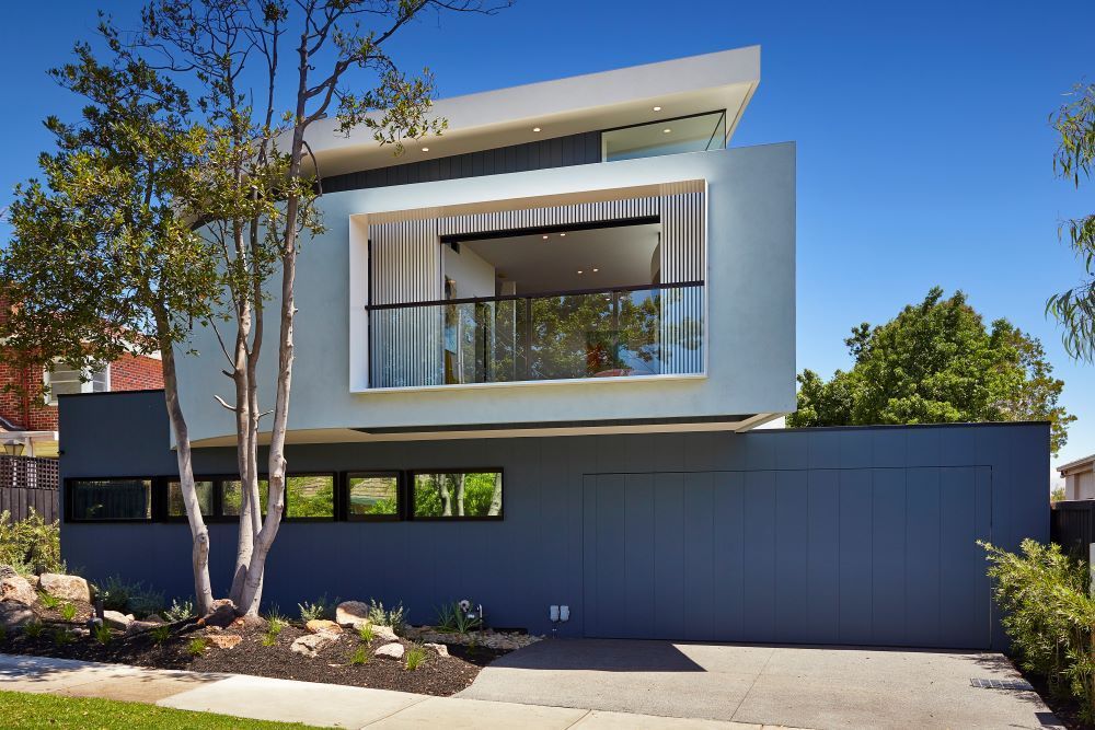 A Modern House With a Large Garage and a Balcony — KM Custom Homes In Mount Eliza, VIC