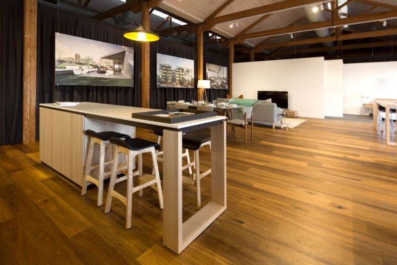 A Large Room With a Table and Stools in It  — KM Custom Homes In Mount Eliza, VIC