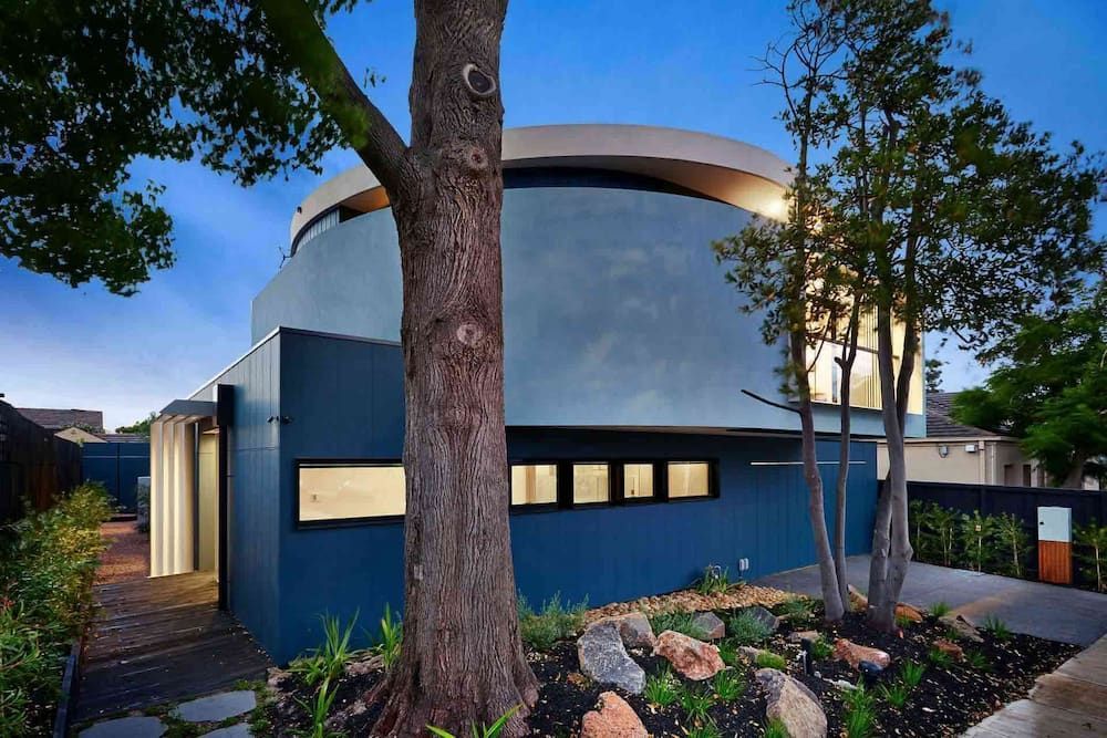 A Bathroom With White Tiles, A Sink, A Mirror And A Bathtub — KM Custom Homes In Mount Eliza, VIC