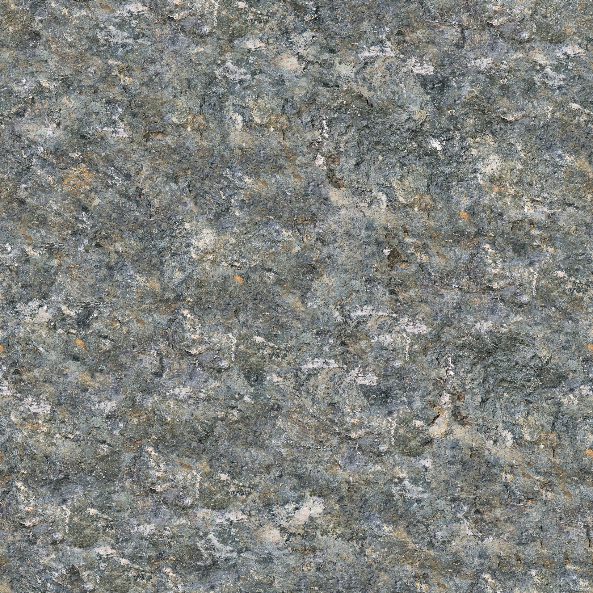 A close up of a gray granite counter top