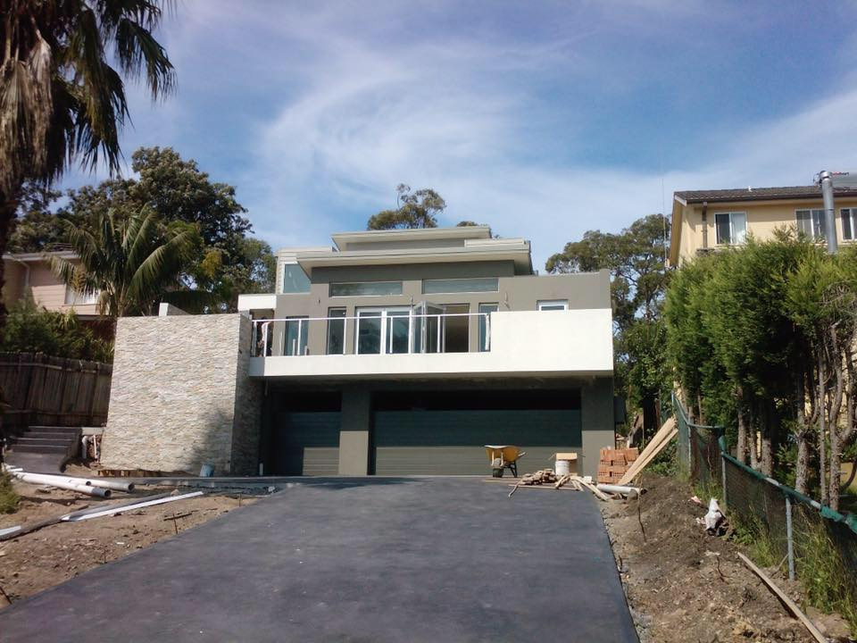 a large house with a driveway leading to it