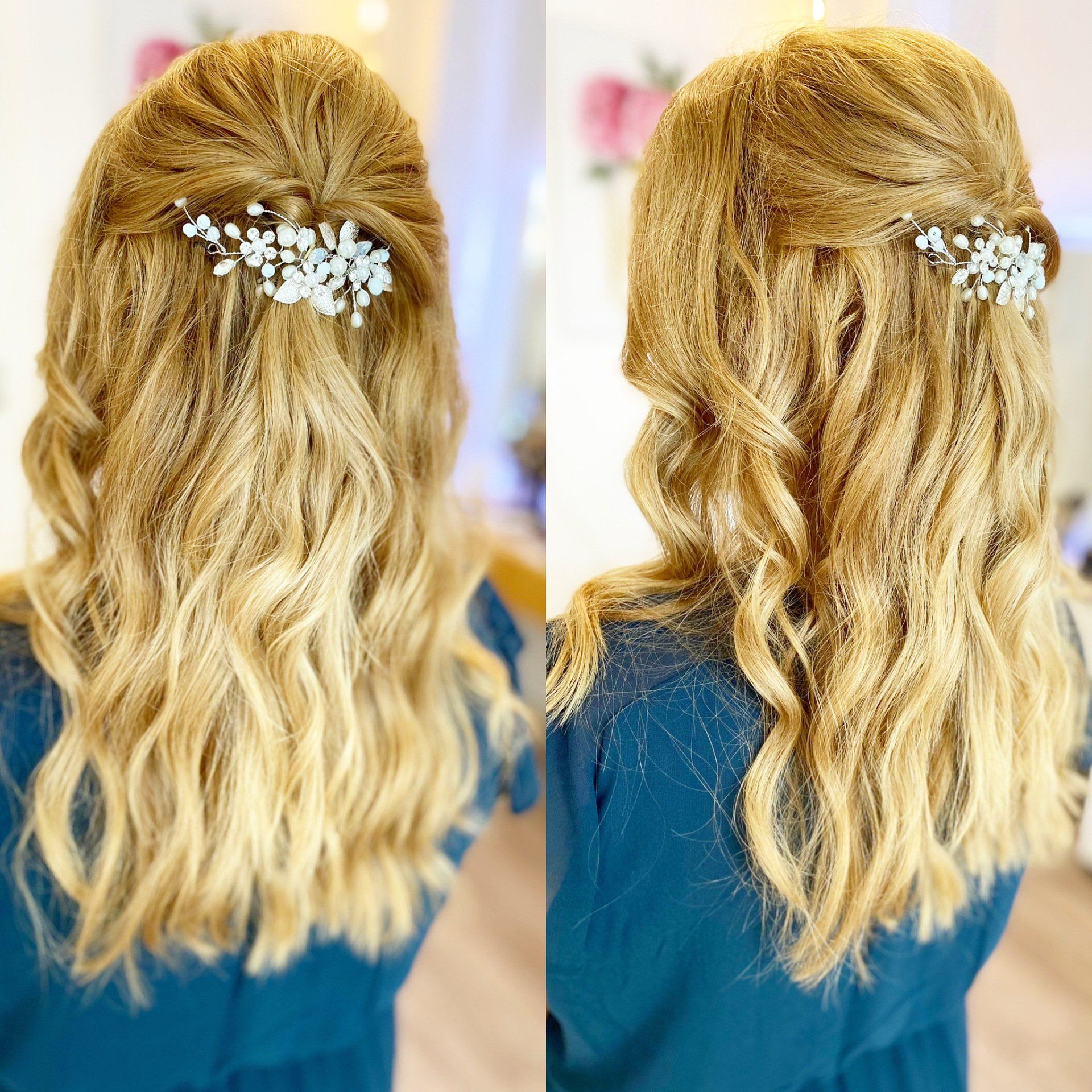 Eine Frau trägt eine halb hochgesteckte, halb offene Frisur und hat Blumen im Haar.