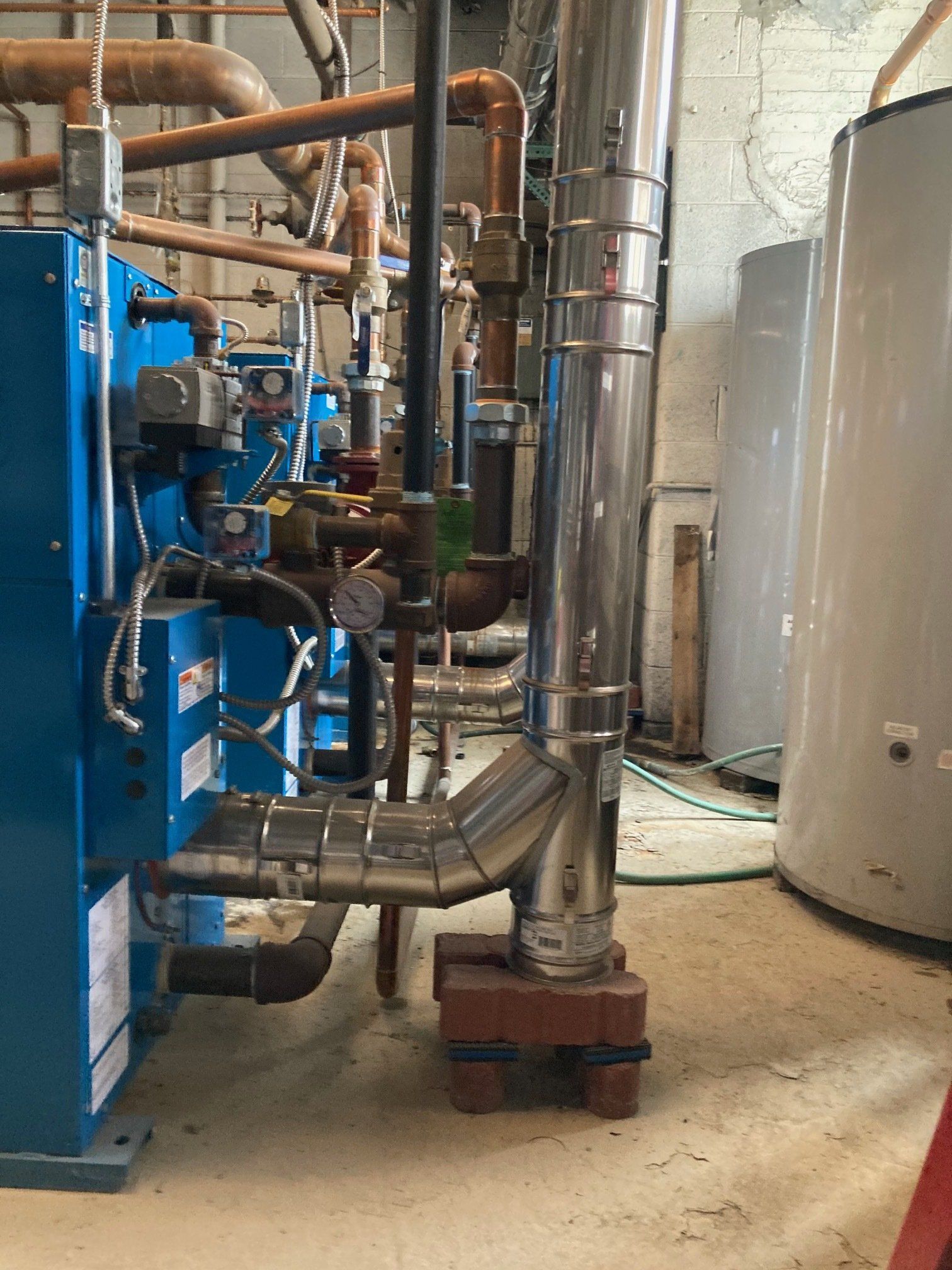 Blue Boiler with Tank — Detroit, MI — Astro Heating & Cooling Inc.