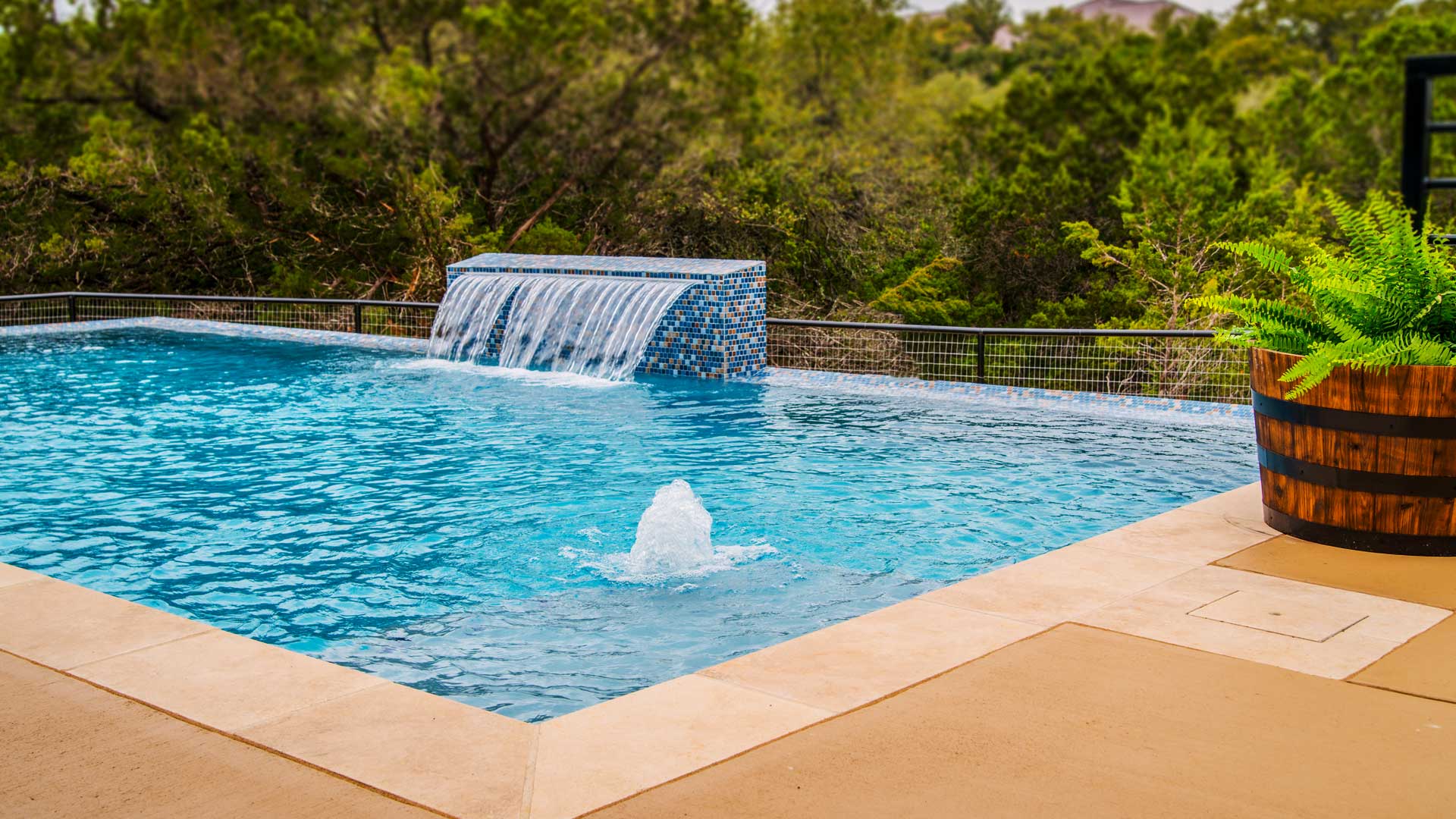 Waterfall feature in pool