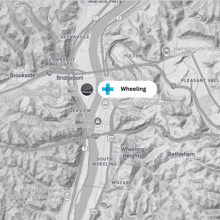 Map of Wheeling, West Virginia, showing roads, buildings, and geographic features like hills and the Ohio River.
