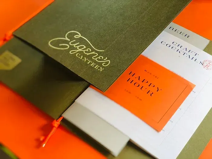 The End Creative Agency shares the menu for Euegene's Canteenin an article about menu design