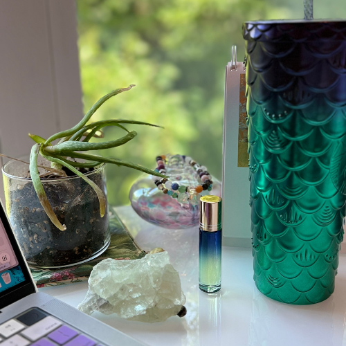 Designgoddess desk with aloe and coffee cup