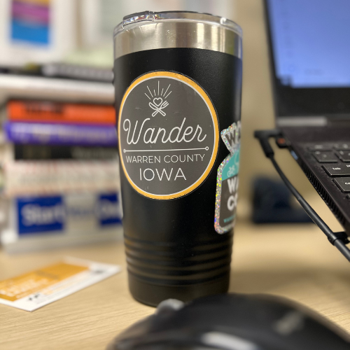 Wander Warren county sticker sample on coffee cup