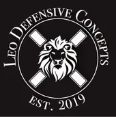 A logo for a company called leo defensive concepts with a lion 's head in a circle.