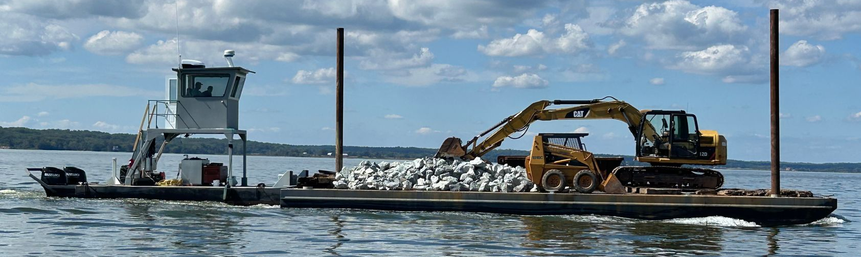 BARGE HAULING ROCKS