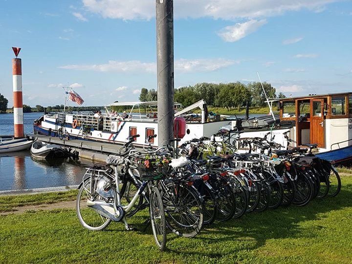 Sailing and cycling holiday at Intersail, bicycles parked, waiting for their next journey