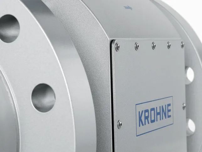Close-up of a silver industrial device with a KRONE logo on a side panel.