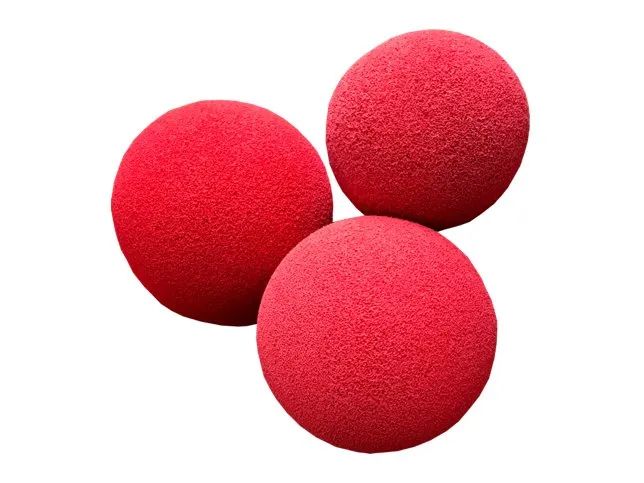 Three red foam balls clustered on a white background