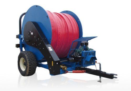 Blue hose reel trailer with a large red coiled hose and tow hitch