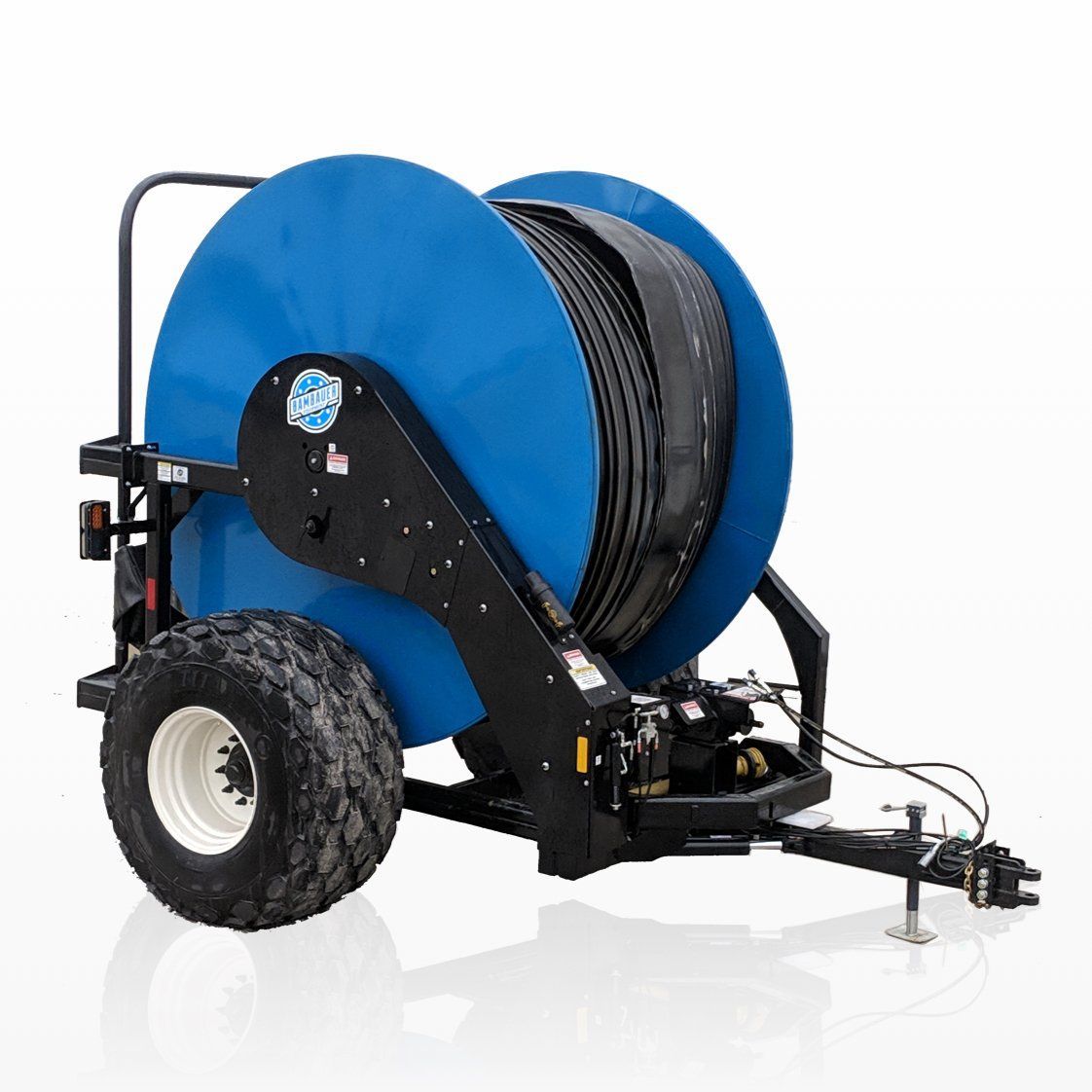 Blue irrigation hose reel cart with large tires and black metal frame on a white background