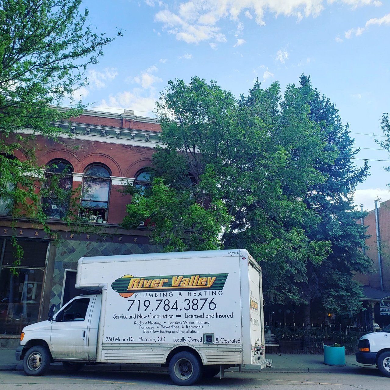 Service Truck Outside The Building — Florence, CO — River Valley Plumbing And Heating LLC