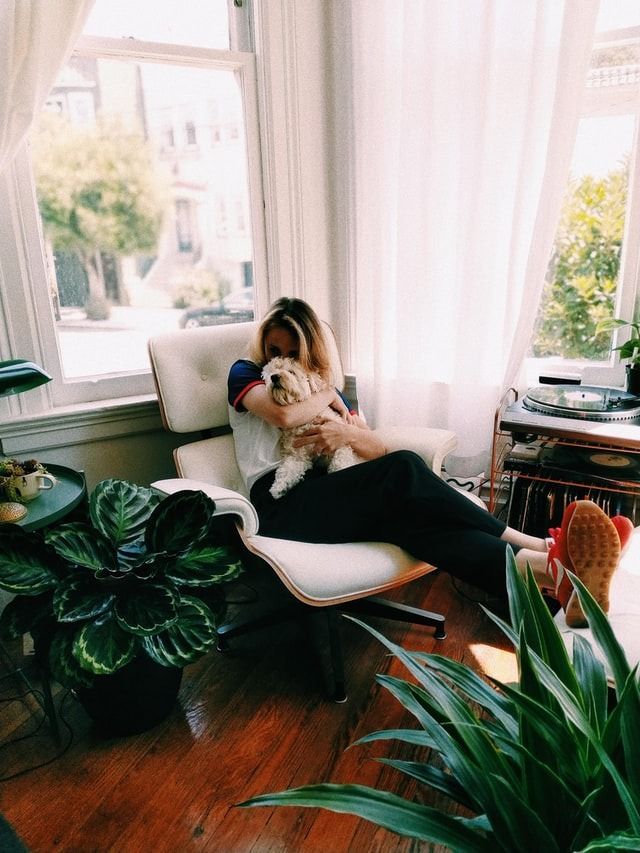 Woman enjoying time with her dog