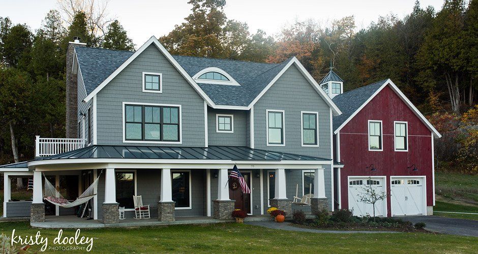 New Homes — Realtor Shaking Hands with the Clients  in Essex, VT