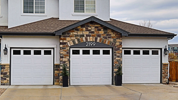 Ankmar full view garage door looking  over Denver