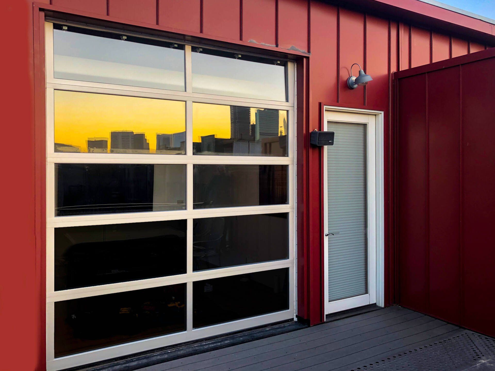 Ankmar full view garage door aluminum Denver skyline in reflection