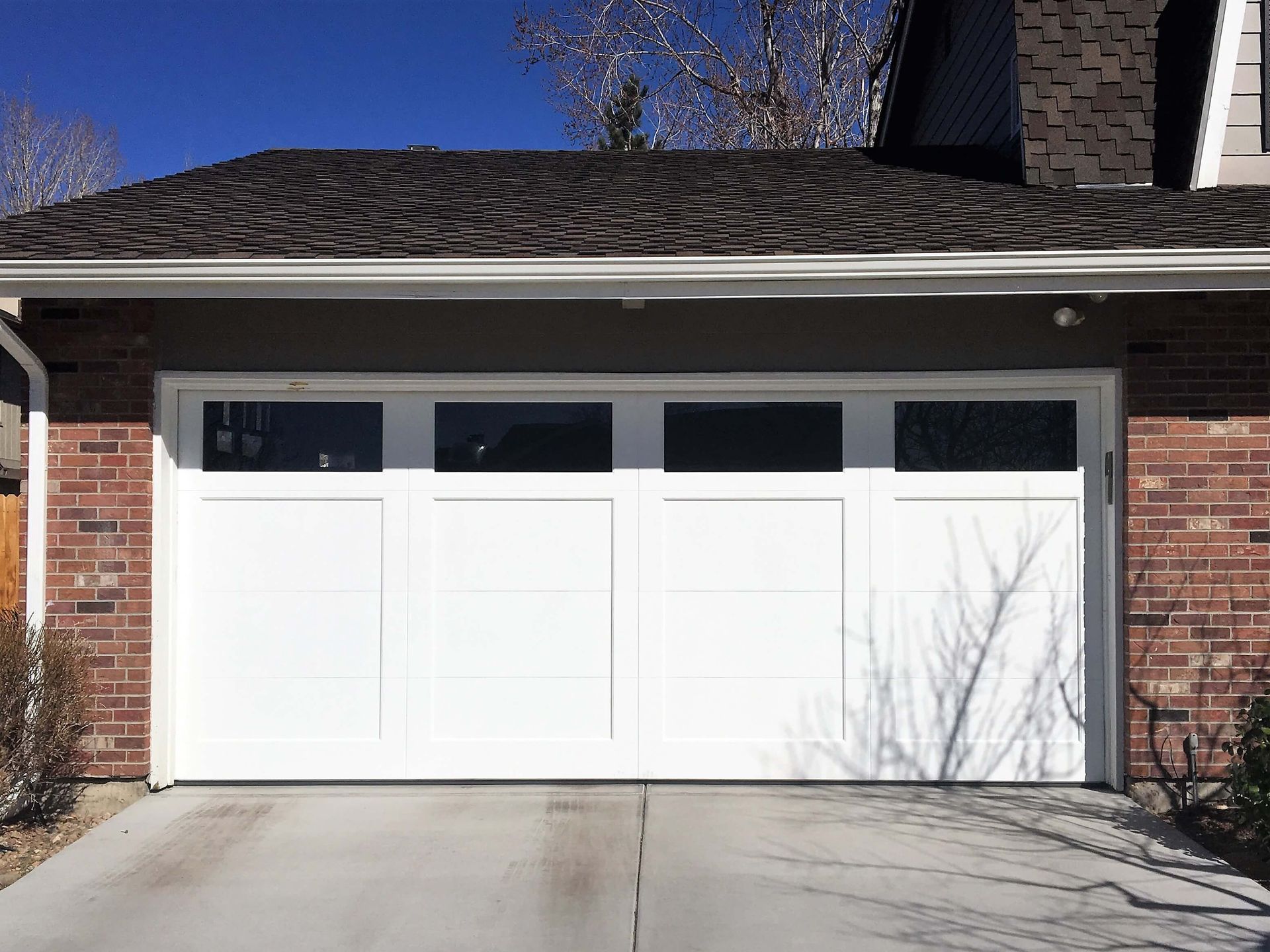 Rustic traditional wooden garage door classic bicycle in front