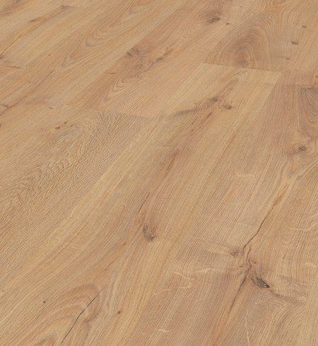 A close up of a wooden floor in a room.