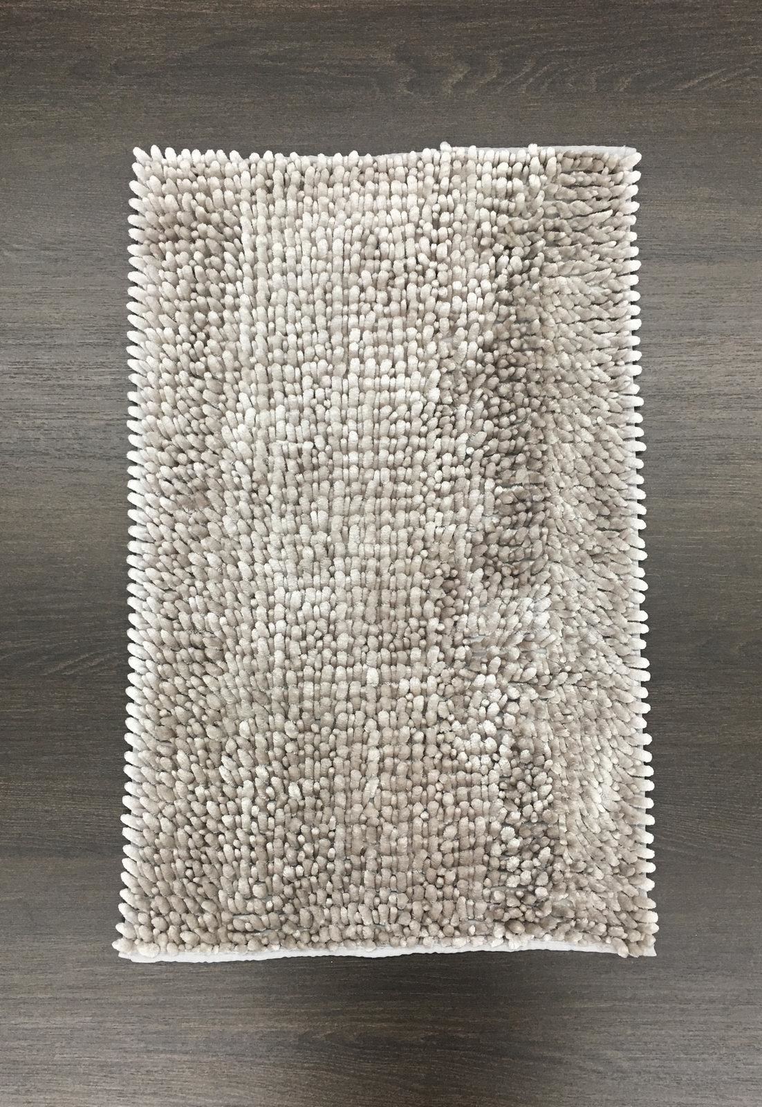 A piece of fabric is sitting on a wooden table