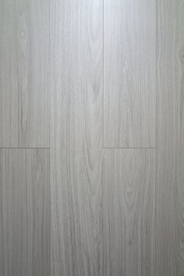 A close up of a white wooden floor.