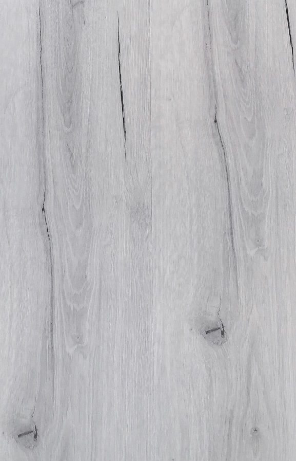 A close up of a white wooden floor.