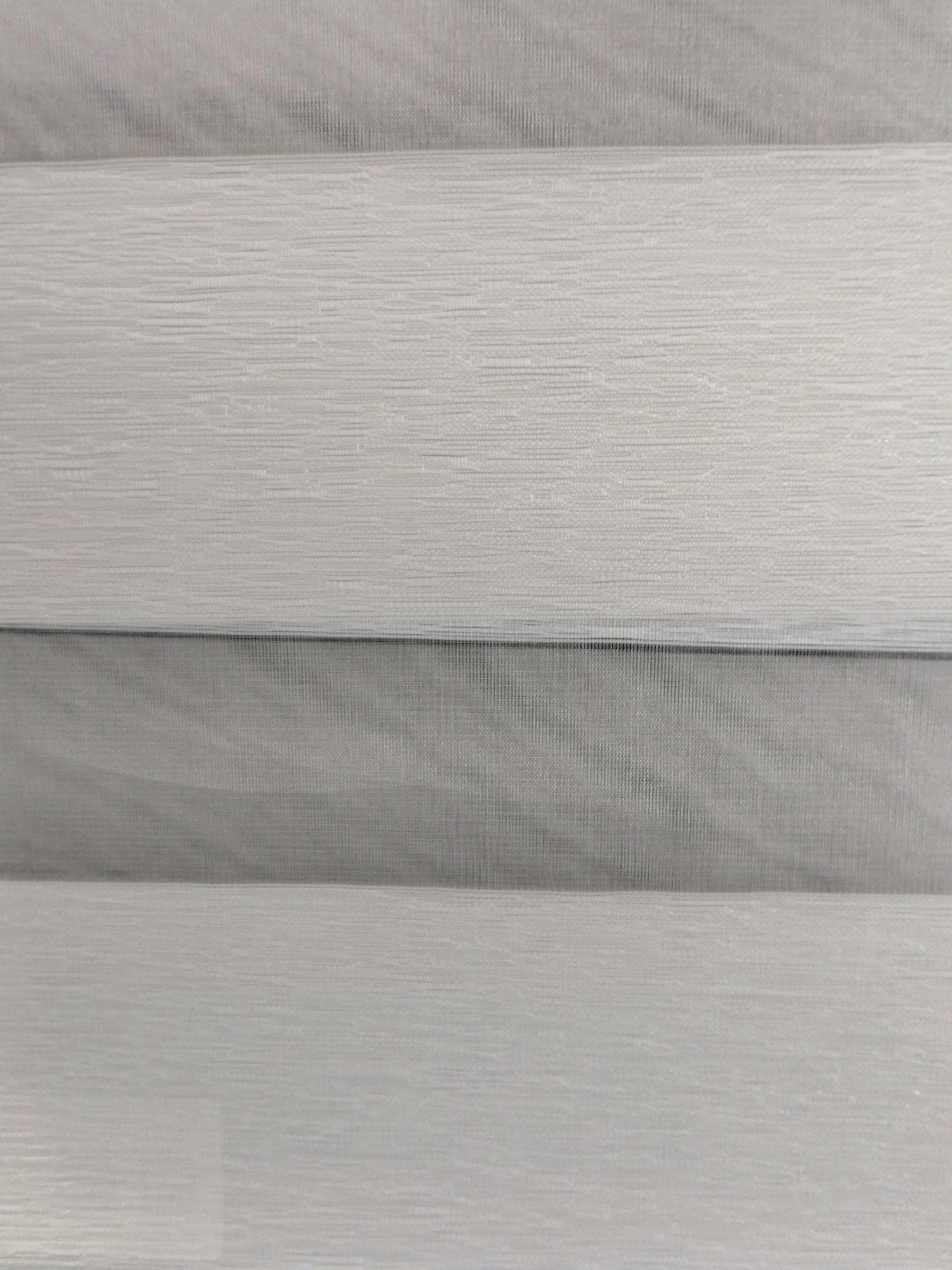 A close up of a piece of white wood.