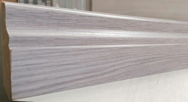 A close up of a piece of wood on a table.