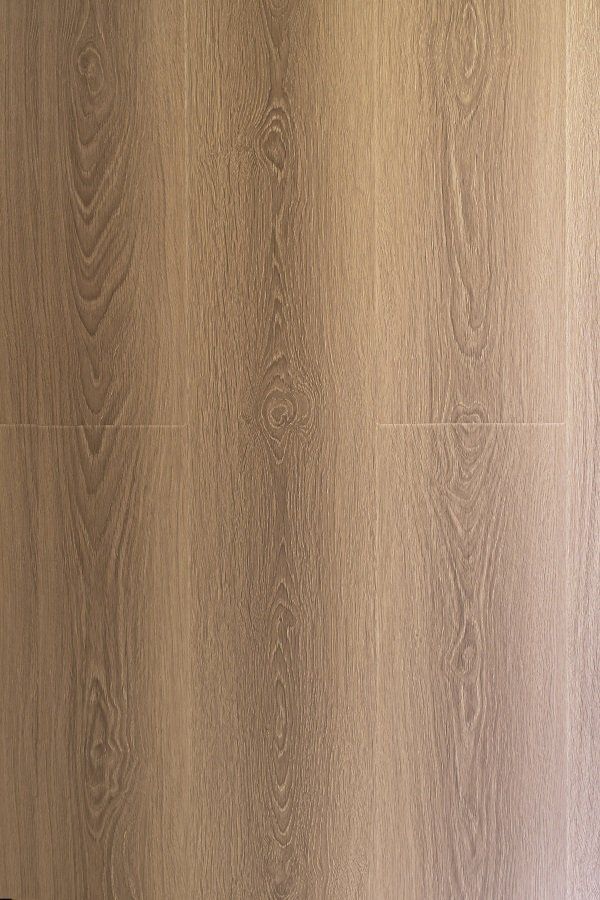 A close up of a wooden floor with a grain and texture.