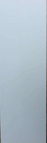 A close up of a white surface with a gray border.