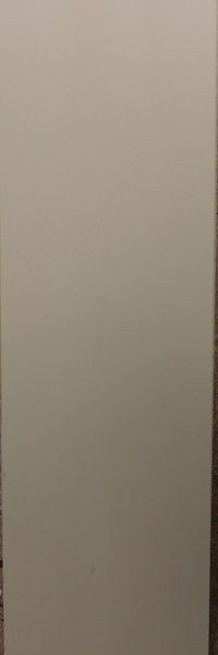 A white sheet of paper is sitting on a table.