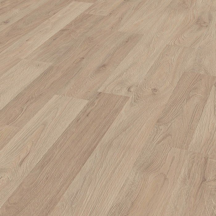 A close up of a wooden floor in a room.