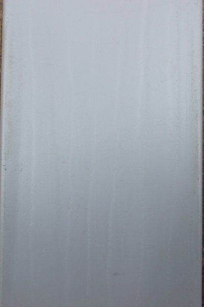 A white piece of paper is sitting on a table.