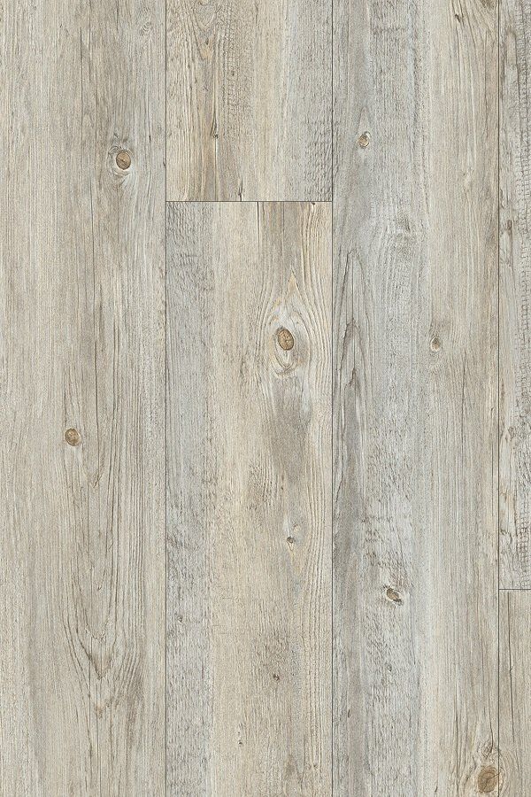 A close up of a white wooden floor.