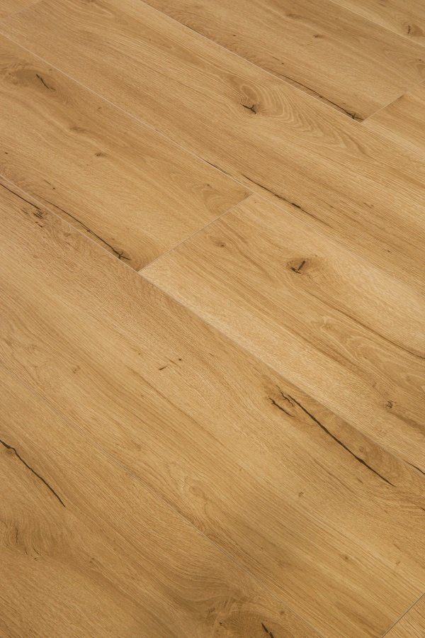 A close up of a wooden floor with a lot of grain.