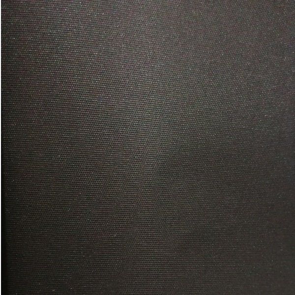 A close up of a piece of black paper with a grid pattern.