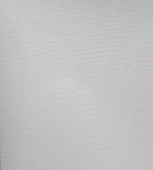 A close up of a piece of white paper.