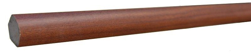 A close up of a piece of wood on a white background.