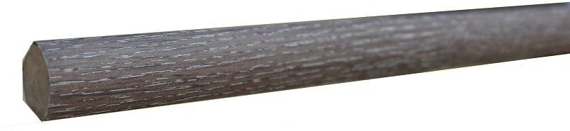 A close up of a piece of wood on a white background.