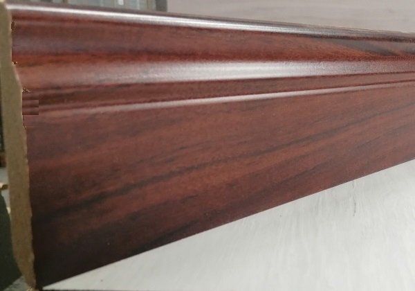 A piece of wood is sitting on top of a table.