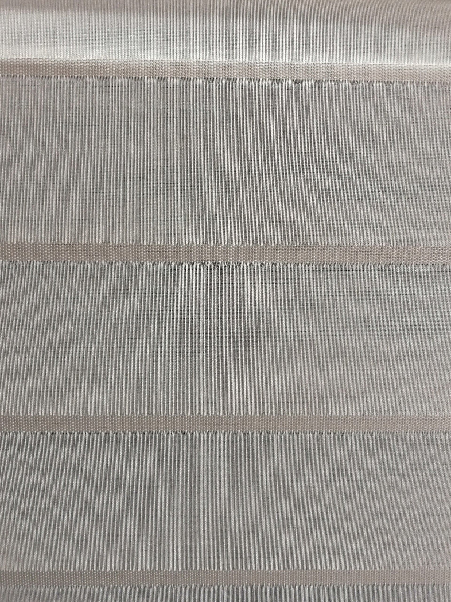 A close up of a piece of fabric with a striped pattern.