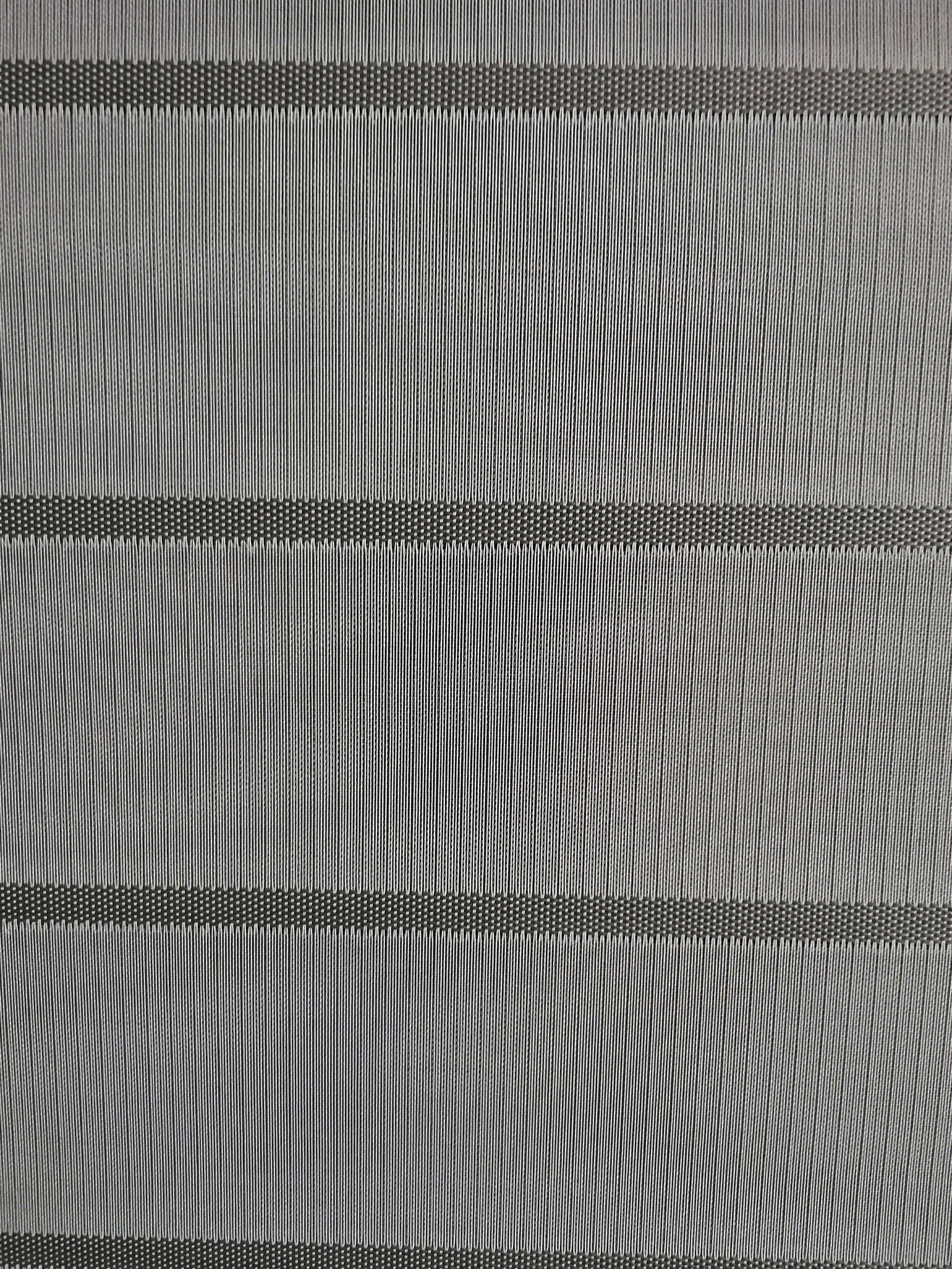 A close up of a black and white striped fabric.