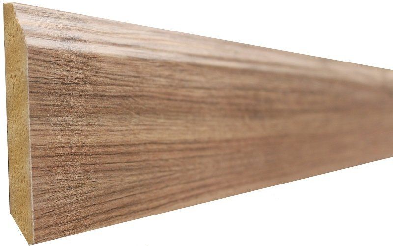A close up of a piece of wood on a white background.