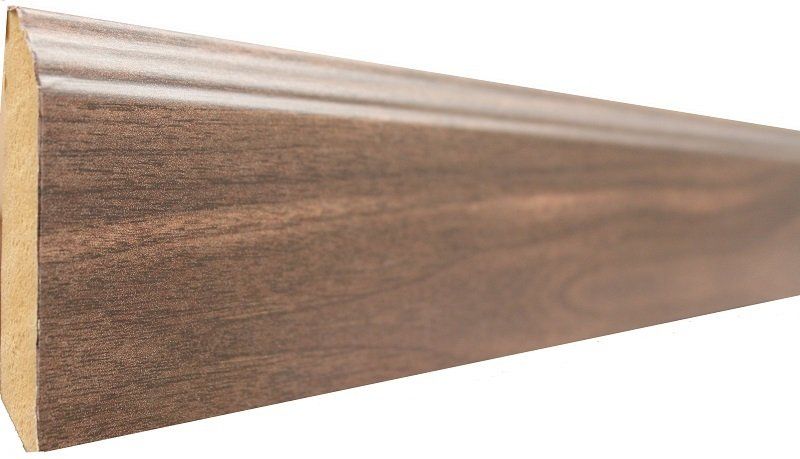 A close up of a piece of wood on a white background.