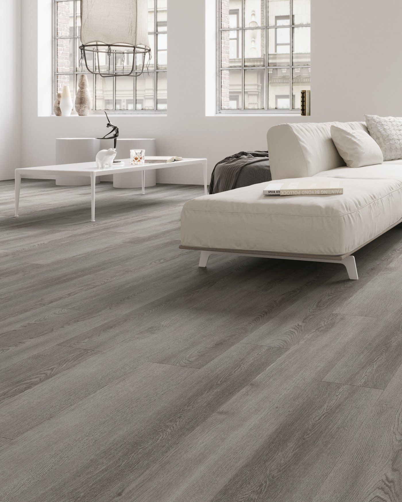 A living room with a couch and two coffee tables