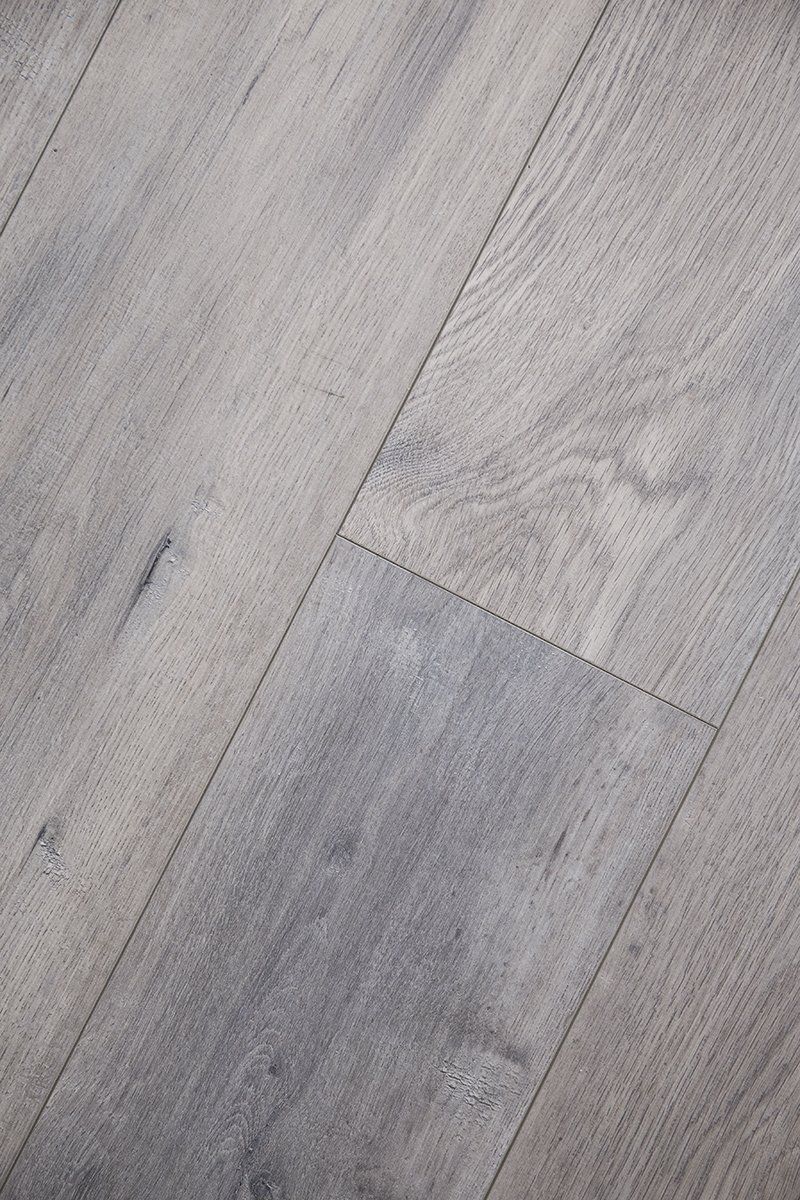 A close up of a gray wooden floor.