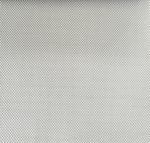 A close up of a white fabric with a grid pattern.